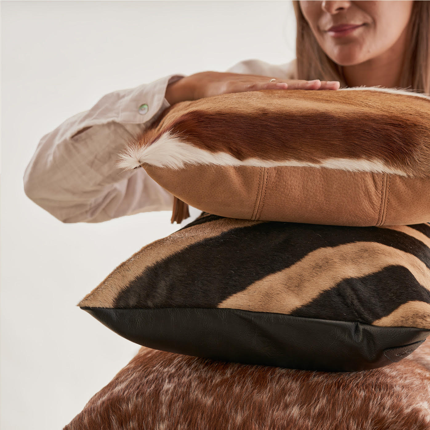 Homeware collection — hide and zebra print cushions